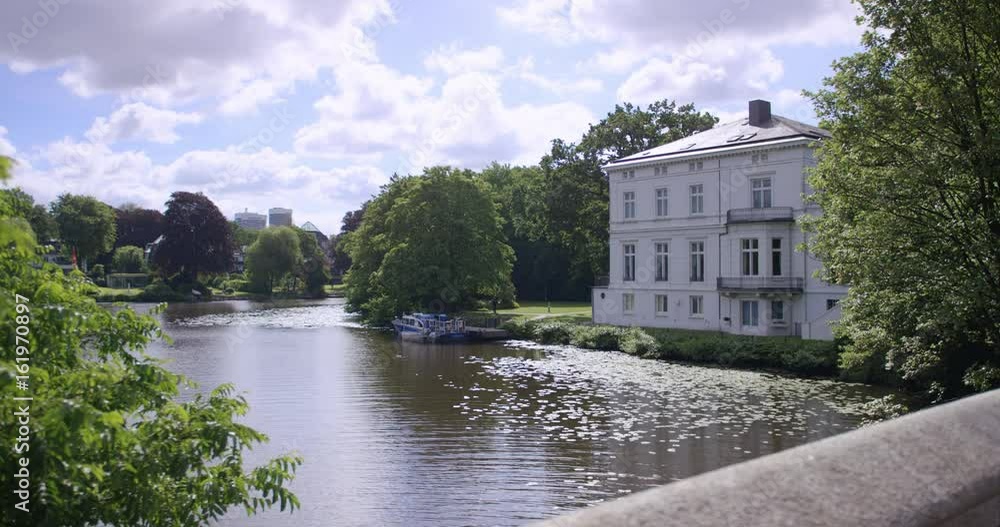 The Guest House of Hamburg Senate with Police Boat in front, Germany The Guest House of Hamburg Senate with Police Boat in front, Germany