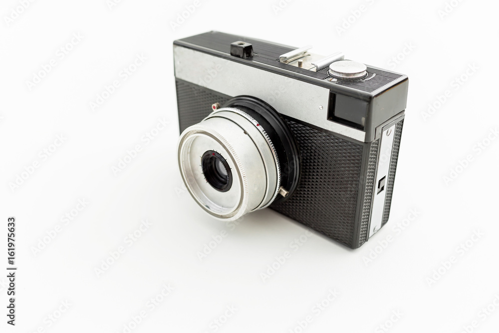 Old camera on white. Flat lay, Top view Old camera on white. Flat lay, Top view