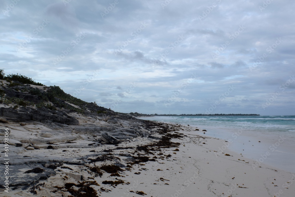 Rocky coast at a white sand beach, Cayo Largo, Cuba Rocky coast at a white sand beach, Cayo Largo, Cuba