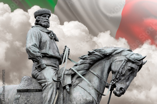 Giuseppe Garibaldi  the Hero of Two Worlds equestrian statue with italian flag on background