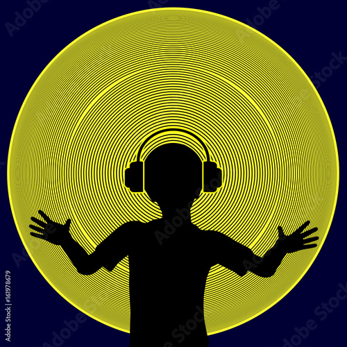 Feeling the Beat. Child with hearing loss experiences the vibration and rhythm of music photo