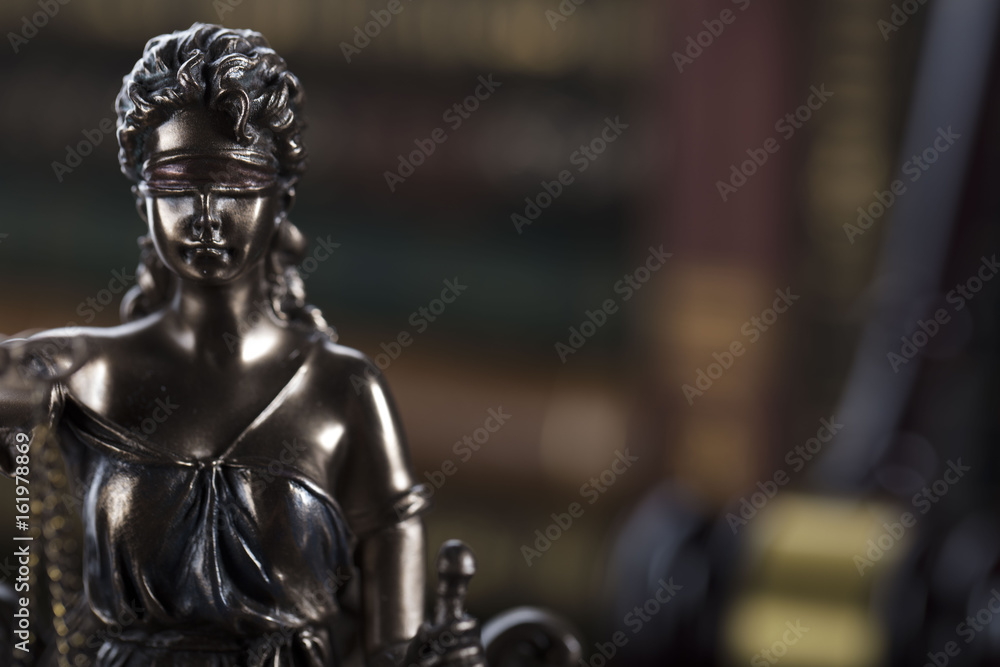 Gavel of the jugde and Themis in the court library. Gavel of the jugde and Themis in the court library.