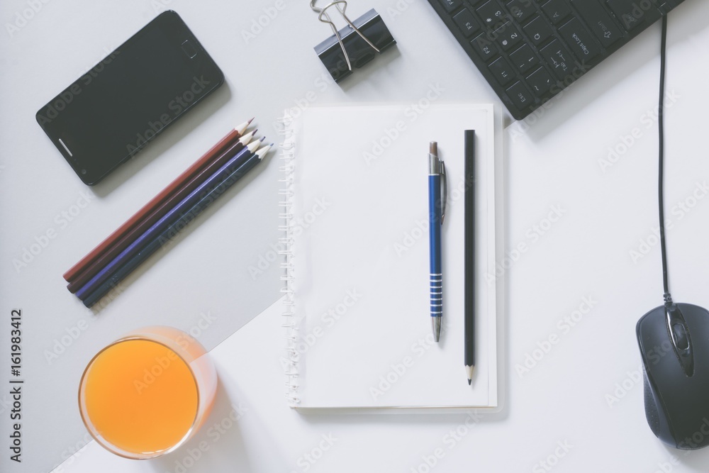 Top view of blank frame on pastel. Colored background office desk with different objects. Minimal flat lay style Top view of blank frame on pastel. Colored background office desk with different objects. Minimal flat lay style