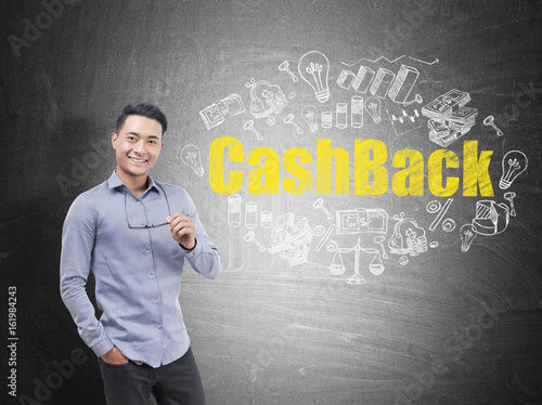 Asian businessman holding glasses, cash back photo