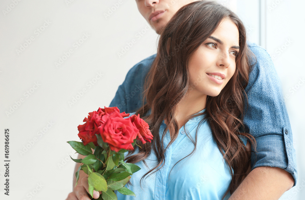 Beautiful couple with bouquet, closeup