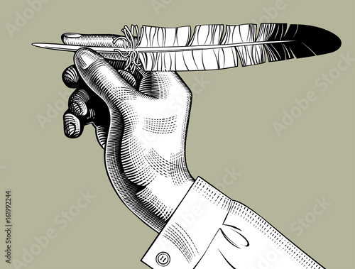 Hand with a feather pen