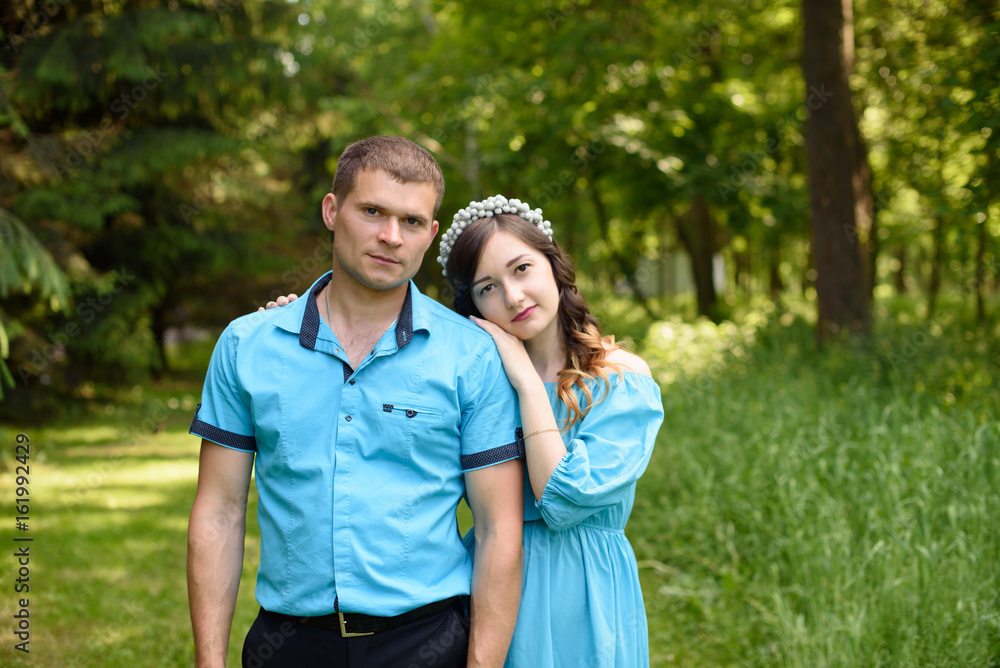Portrait of a happy pregnant couple in nature Portrait of a happy pregnant couple in nature