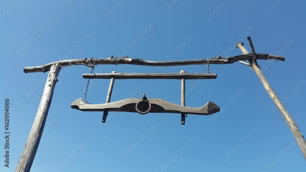 Bullish wooden yoke against the sky Bullish wooden yoke against the sky