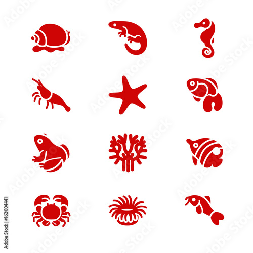 The most popular aquarium inhabitants as glyph icons / There are typical aquarium inhabitants like snail, fishes, crabs and corals
