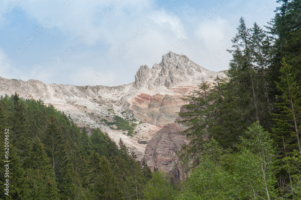 Triassic reefs over colorful layers in the top of Bletterbach canyon, Dolomites, Italy Triassic reefs over colorful layers in the top of Bletterbach canyon, Dolomites, Italy