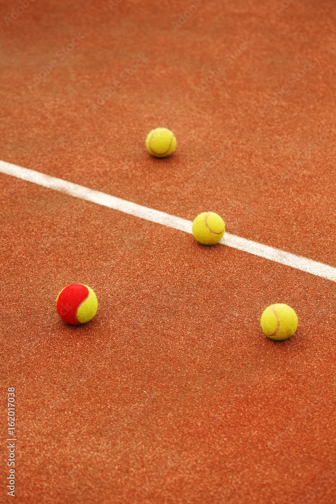 Ball on tennis court background