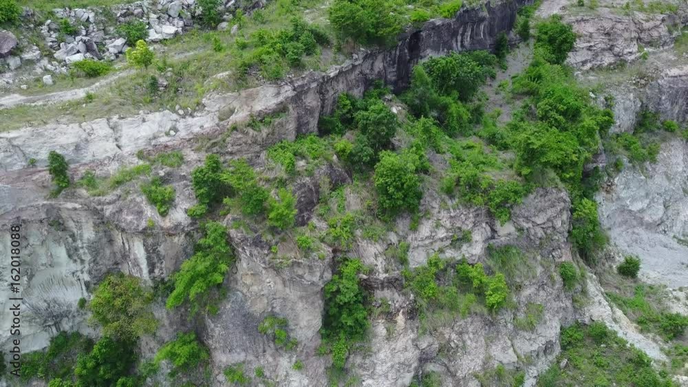 Calcite mountain with forest around Calcite mine in Thailand, aerial view from drone Calcite mountain with forest around Calcite mine in Thailand, aerial view from drone