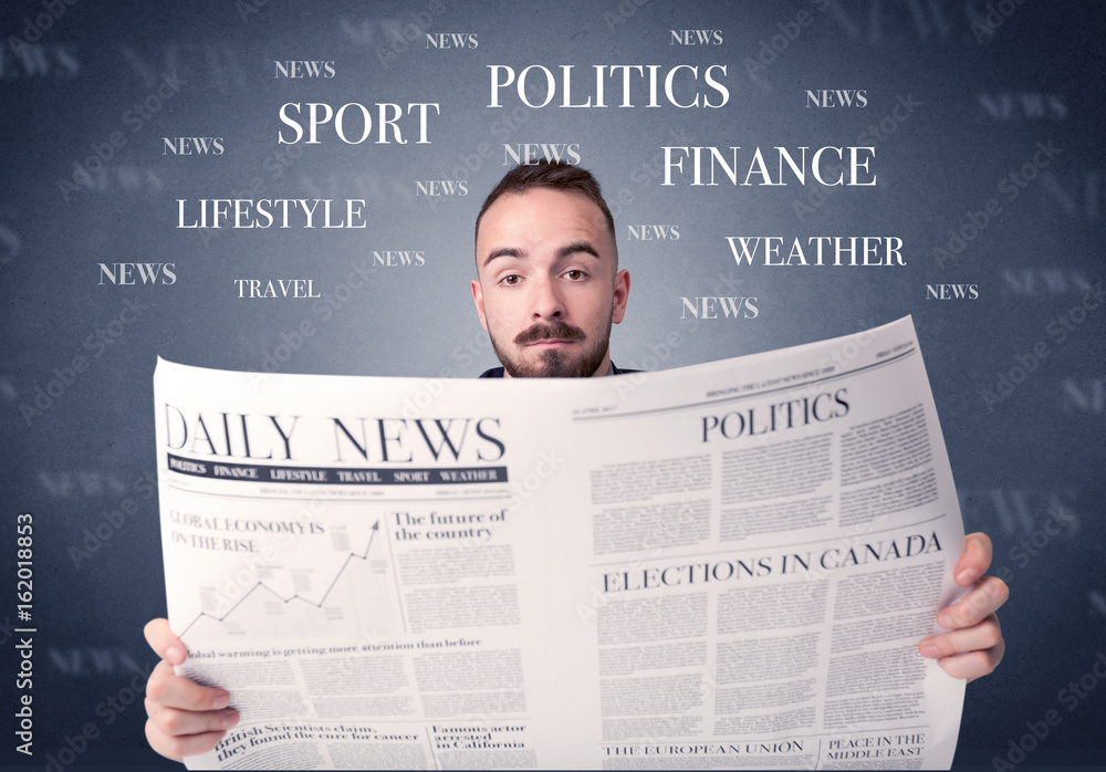Businessman reading newspaper Businessman reading newspaper