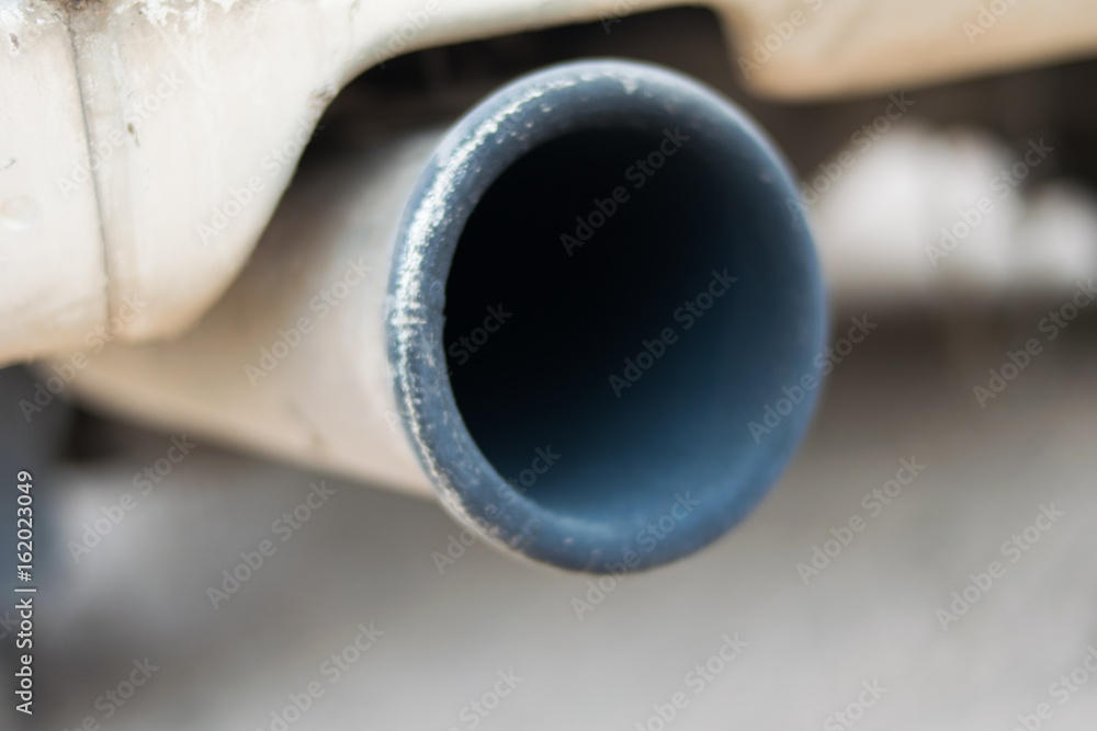 close up car exhaust pipe