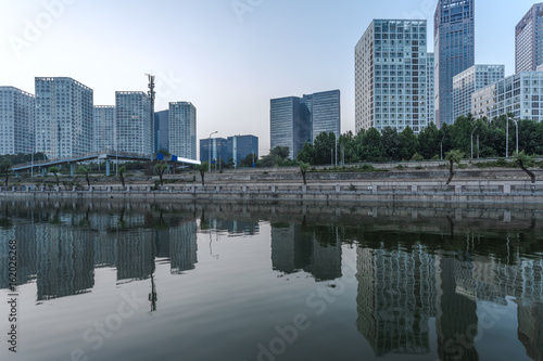 River And Modern Buildings Against Sky in Tianjin,China.