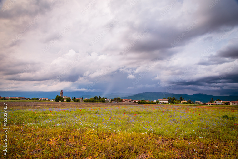 Evening storm over the medieval village Evening storm over the medieval village