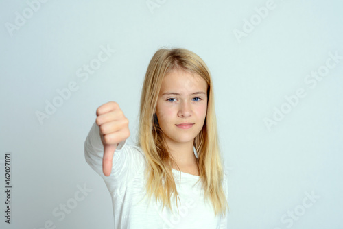 Wallpaper Mural girl with thumb down Torontodigital.ca