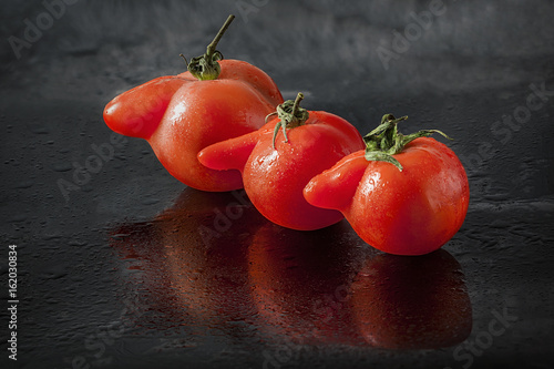 Three tomatoes photo