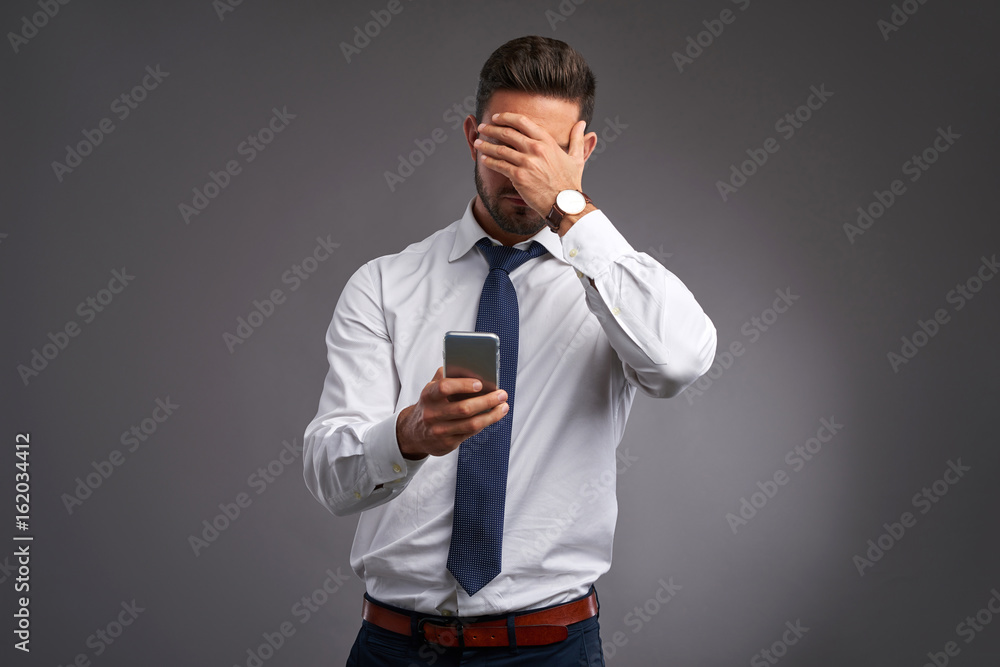 Young man with a smartphone Young man with a smartphone