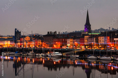 Fotografie Waterford, Ireland. Panoramic view of a cityscape at night