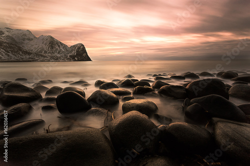 Beautiful sunset over lofoten islands, norway, in a stormy day