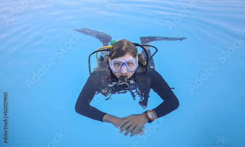 Scuba diver swimming in the water