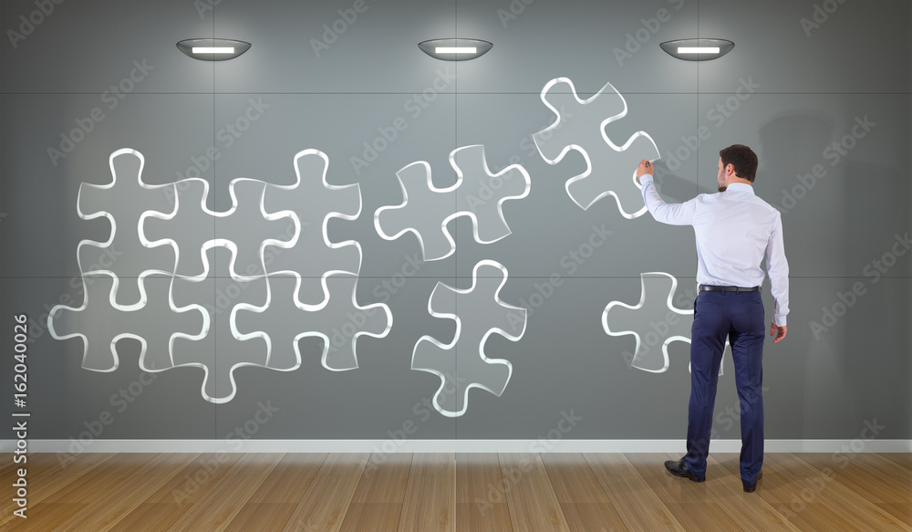 Businessman searching puzzle solution on a wall 3D rendering Businessman searching puzzle solution on a wall 3D rendering