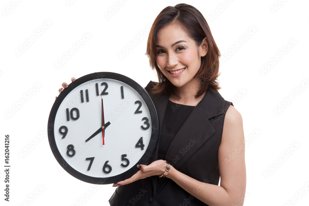 Young Asian woman with a clock. Young Asian woman with a clock.