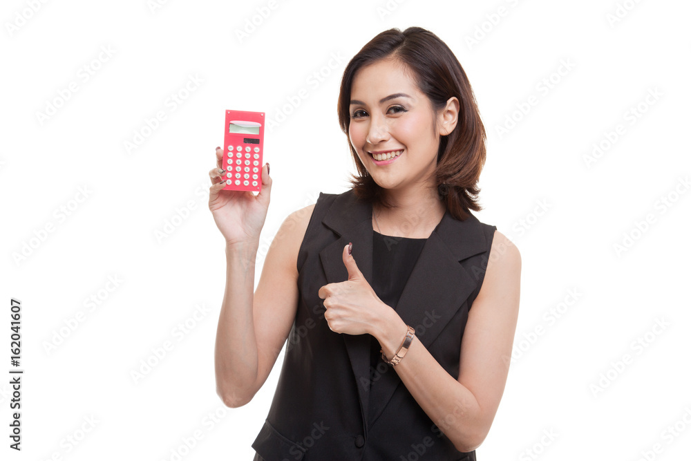 Asian woman thumbs up with calculator. Asian woman thumbs up with calculator.