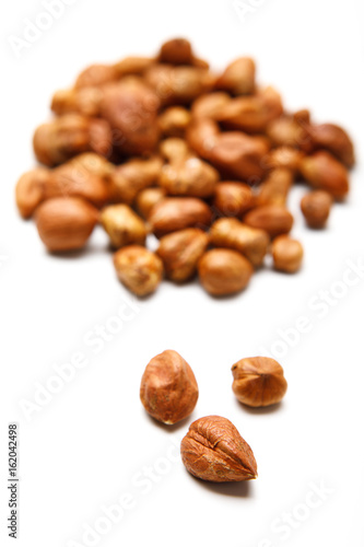 Hazelnuts isolated on white background