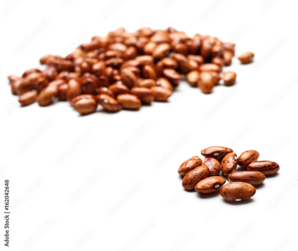 Pile of dark speckled kidney beans isolated on white background Pile of dark speckled kidney beans isolated on white background