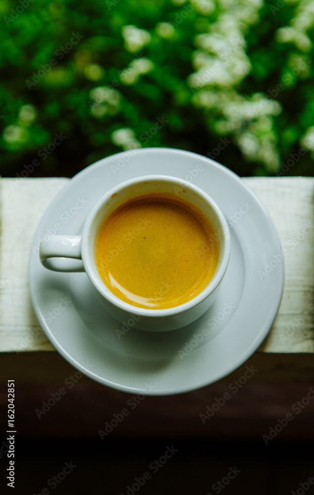 Invigorating fragrant coffee in the cup in the morning for breakfast Invigorating fragrant coffee in the cup in the morning for breakfast