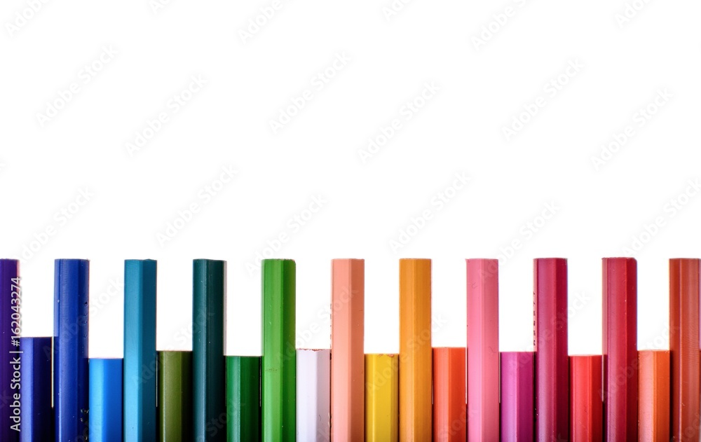 Many colored pencils isolated on white background, place for text Many colored pencils isolated on white background, place for text