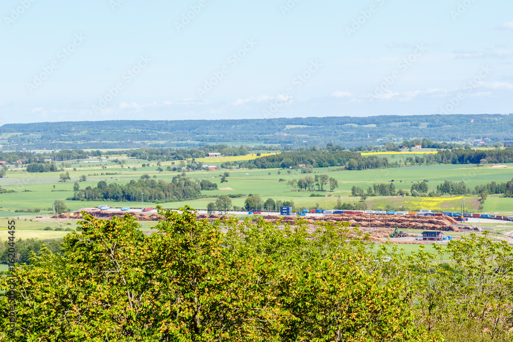 Lumber yards in a rural landscape view