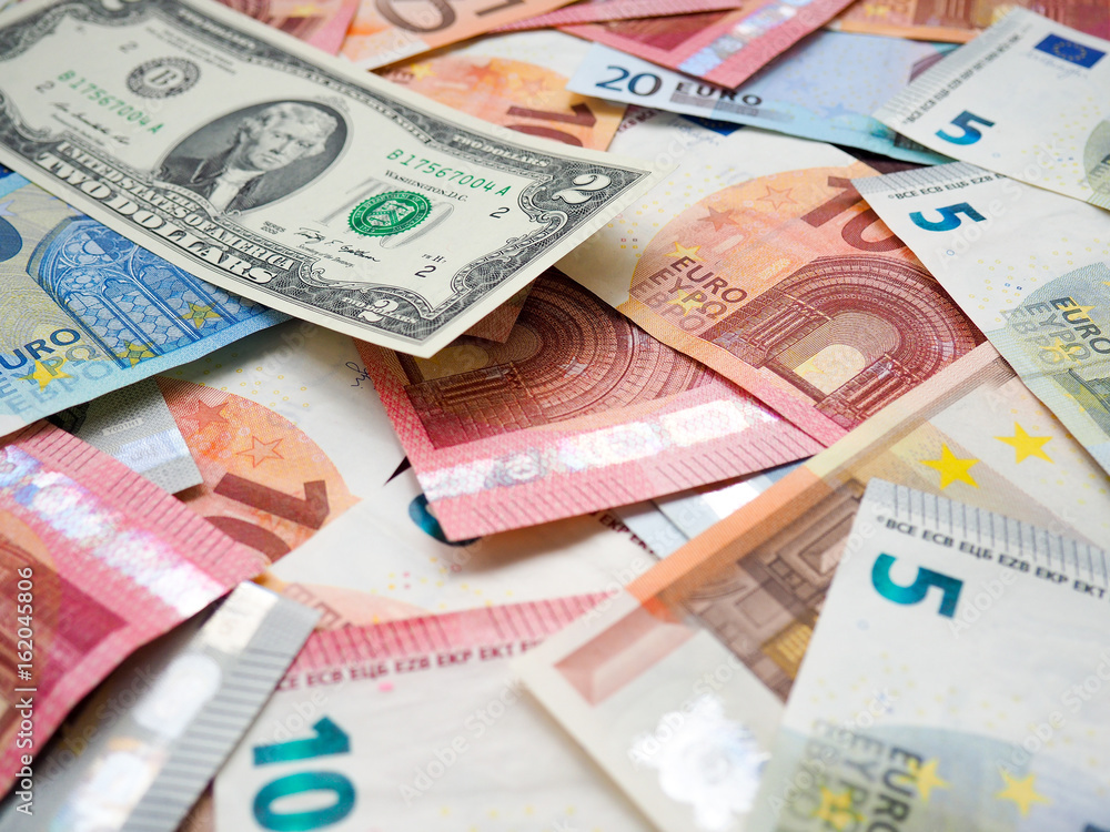the piles of euros and dollars, concept of Finance, profit, loss, currency, banknotes, trading, financial markets the piles of euros and dollars, concept of Finance, profit, loss, currency, banknotes, trading, financial markets