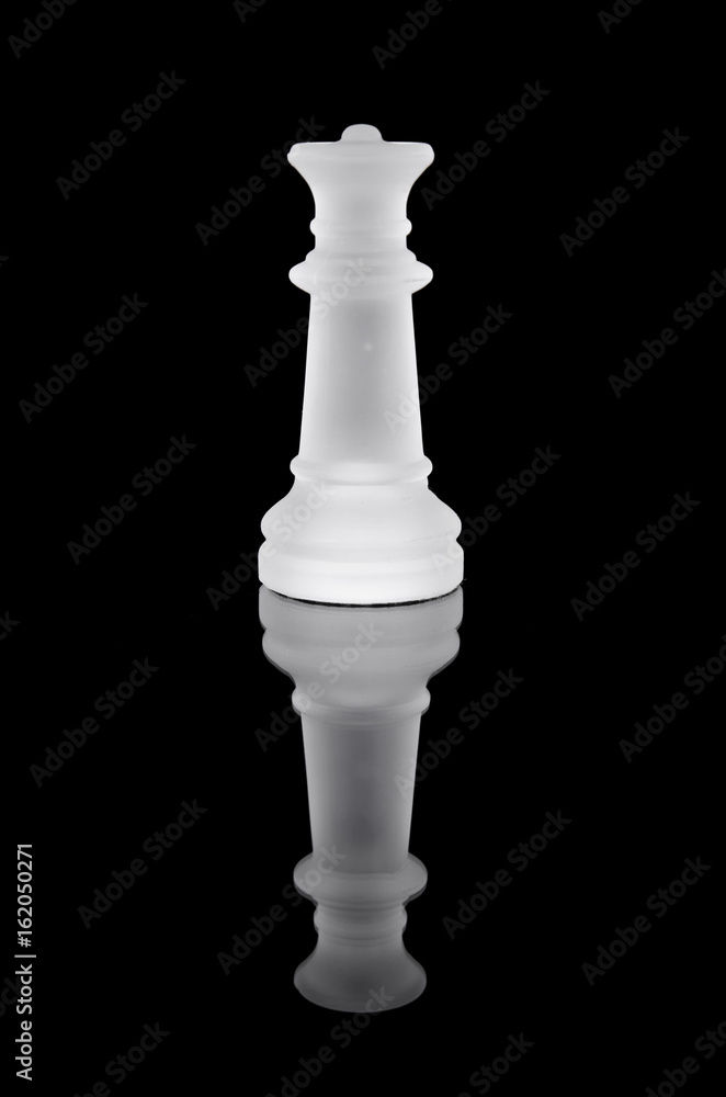 Glass chess queen on black isolated background. Glass chess queen on black isolated background.