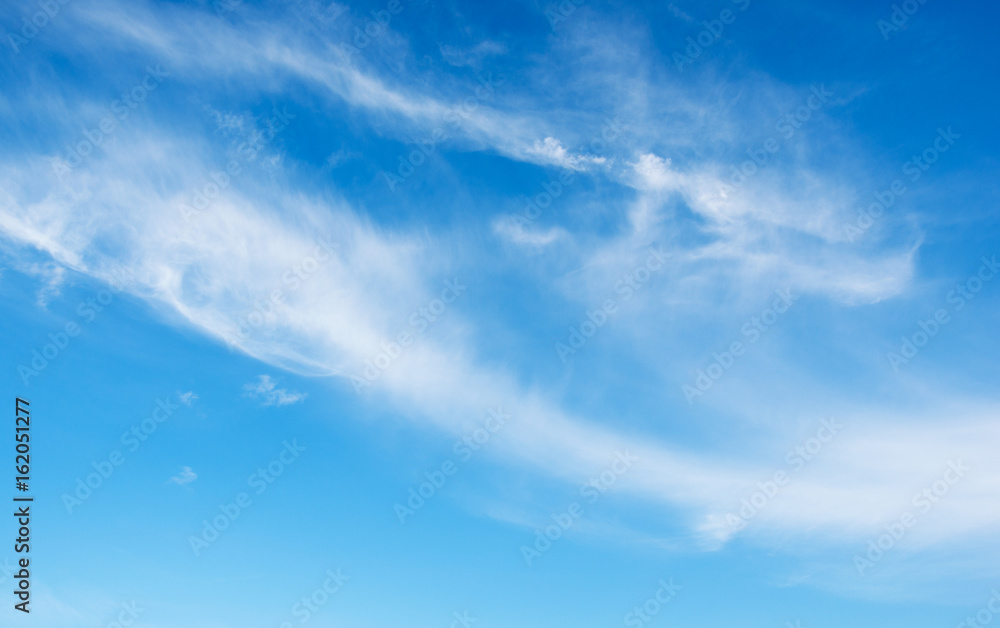 White clouds in blue sky.