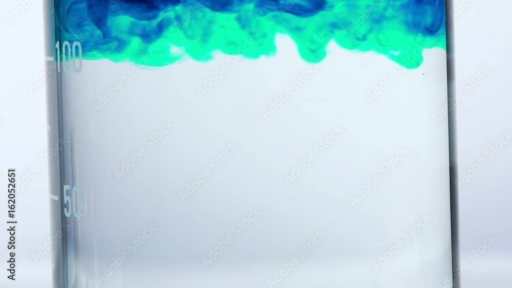 Close-up: chemical experiment and transformations inside a test tube or ...