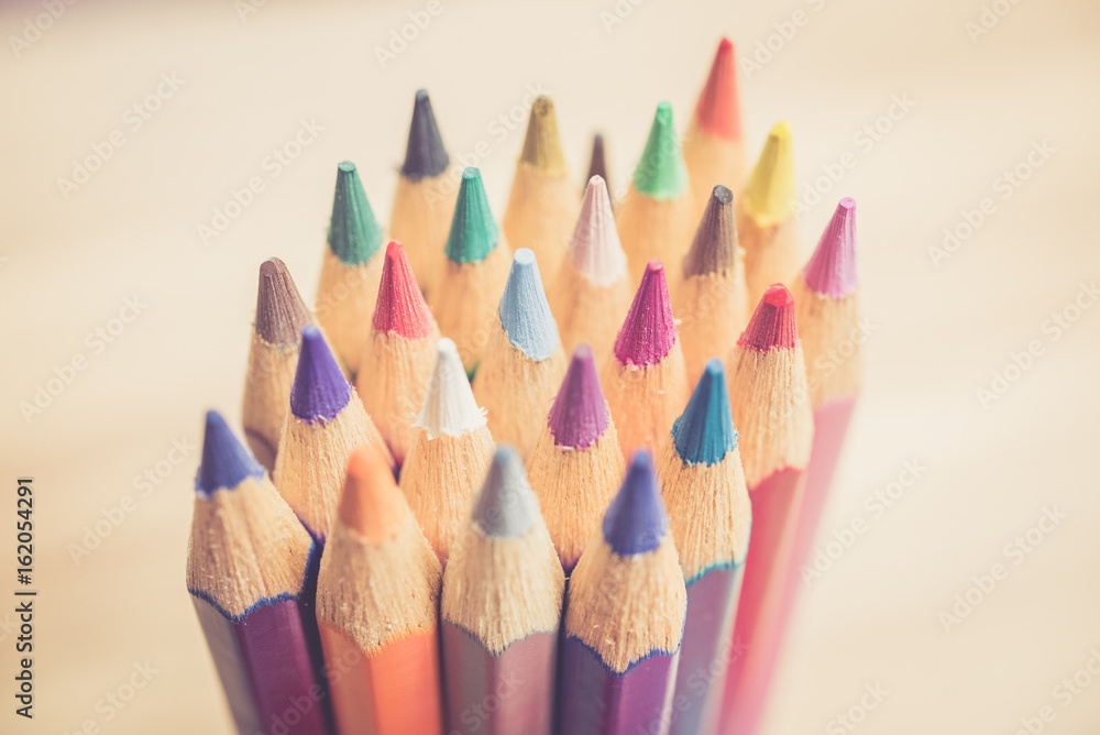 close up colour pencils isolated on white background , warm tone close up colour pencils isolated on white background , warm tone