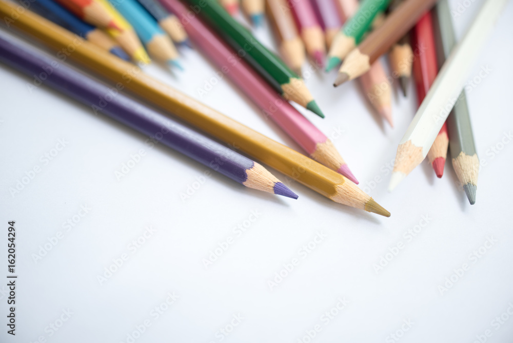 close up colour pencils isolated on white background