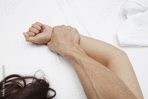A hairy man's hand holding a woman hand for rape and sexual abuse concept