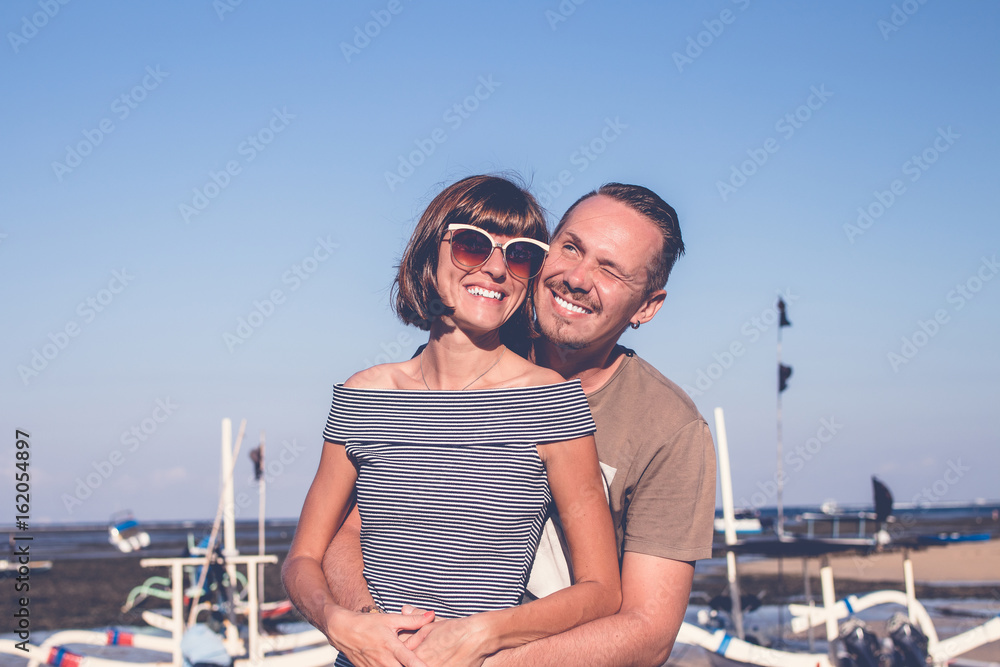 Happy couple in love on beach summer vacations.Tropical sialnd Bali, Indonesia.