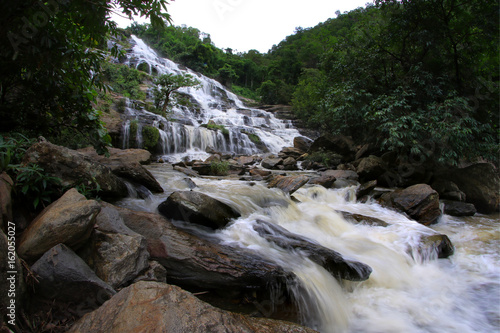 Beautiful waterfall in tropical forest, Southeast Asia.