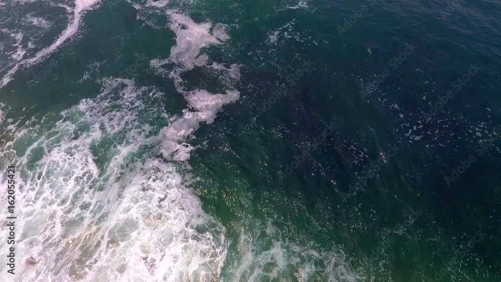 Aerial view of ocean Portugal waves crashing on beach, drone footage. Aerial view of ocean Portugal waves crashing on beach, drone footage.