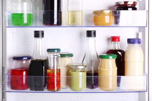 Many different sauces in fridge