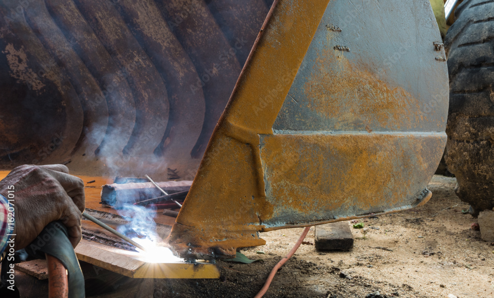 Worker welding