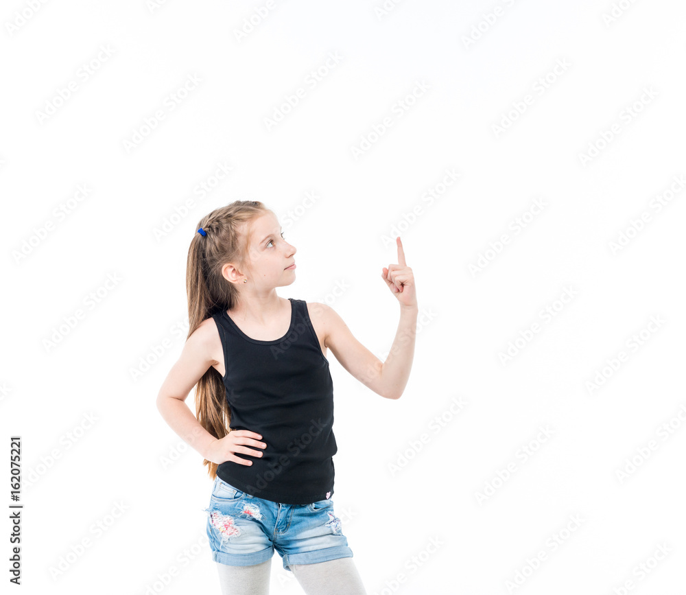 Teen girl with straight hair pointing upward