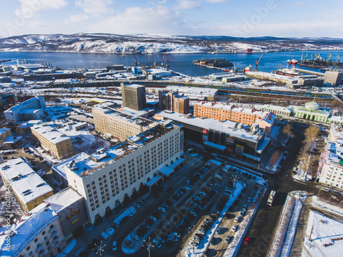 Beautiful aerial air winter vibrant view of Murmansk  Russia  a port city and the administrative center of Murmansk Oblast  Kola peninsula  Kola Bay  shot from quadcopter drone  