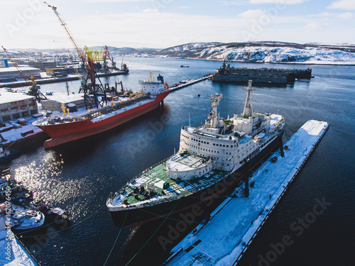 Beautiful aerial air winter vibrant view of Murmansk, Russia, a port city and the administrative center of Murmansk Oblast, Kola peninsula, Kola Bay, shot from drone 