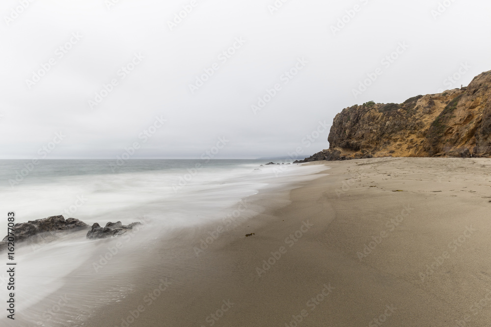 Pirates Cove and Point Dume with motion blur and clouds in Malibu, California.